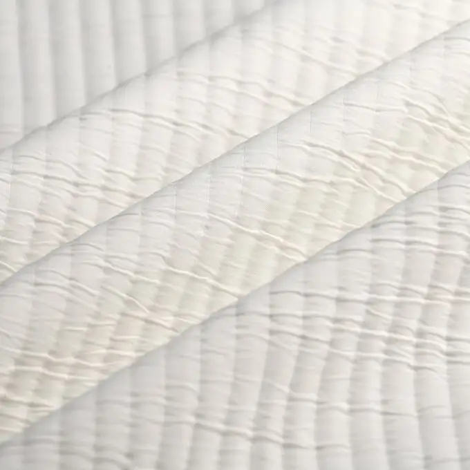 Tessuto trapuntato leggero in poliestere ecru