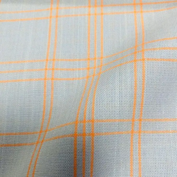 Tessuto cotone quadri tartan blu cielo e arancione fluo