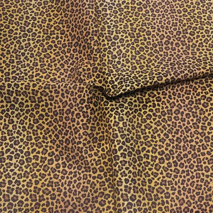 Tessuto voile di cotone morbido giallo senape piccolo leopardo marrone