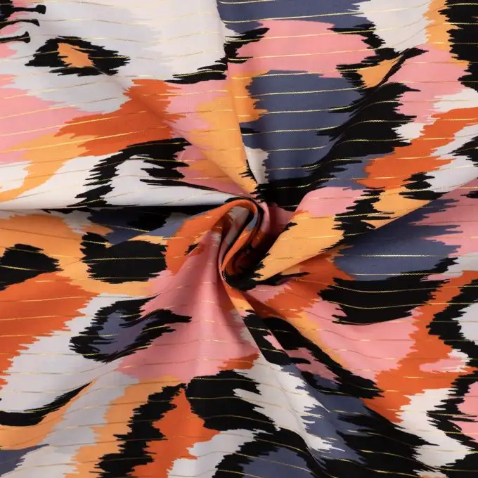 Tessuto voile cotone righe lurex stampato forma astratta blu