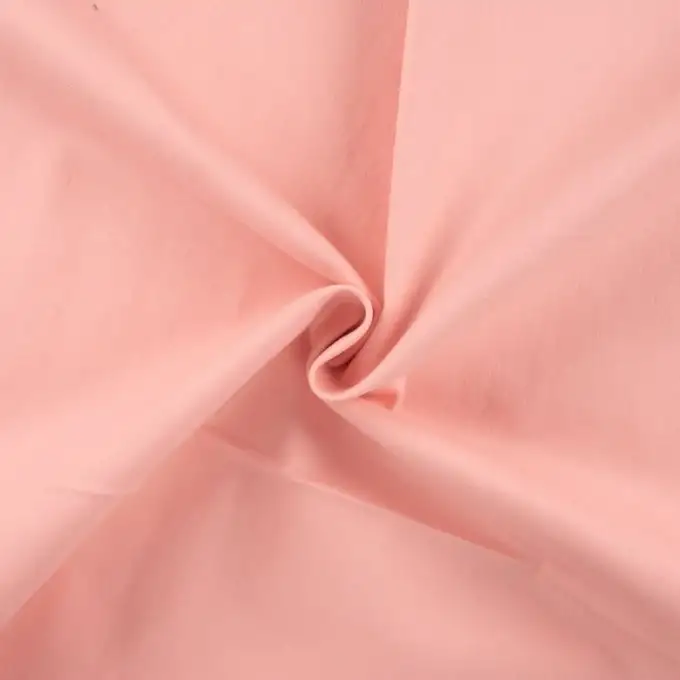 Tessuto denim cotone elasticizzato rosa salmone