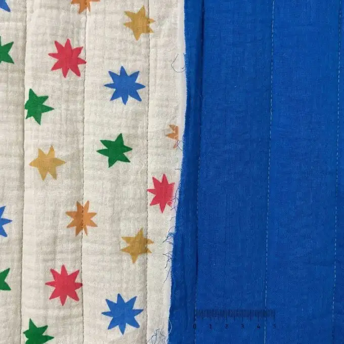 Tessuto trapuntato doppio garza stella pop retro unito blu