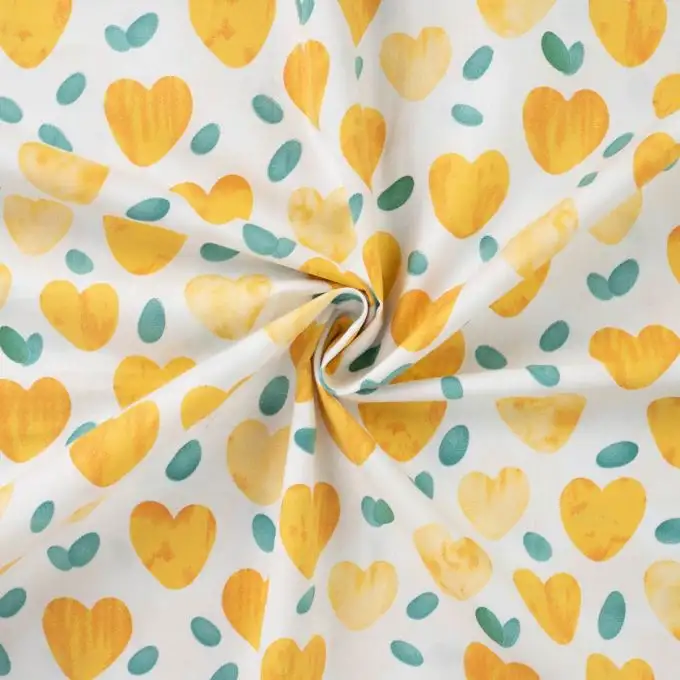 Tessuto popeline cotone stampato cuore pastello blu