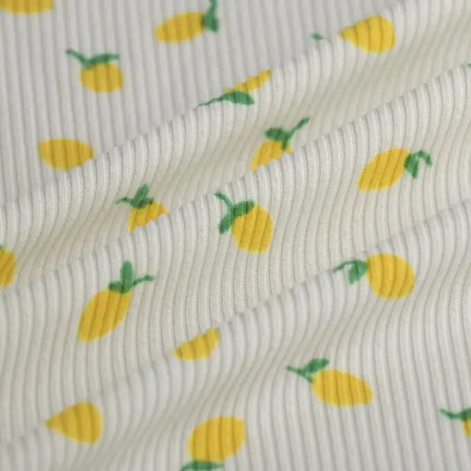 Tessuto a coste fantasia poliestere elasticizzato limoni écru
