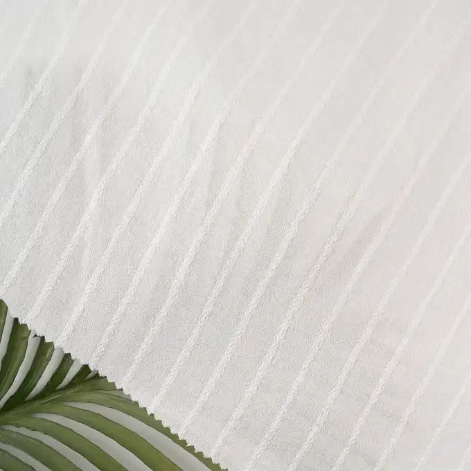 Tessuto voile cotone viscosa rilievo linea ecru