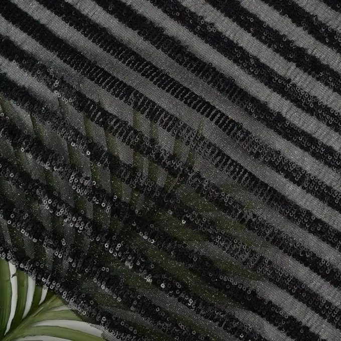 Tessuto rete fantasia paillettes nere