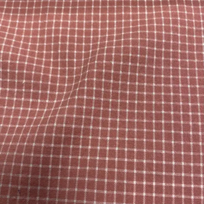 Tessuto cotone poliestere piccoli quadretti rosa deserto