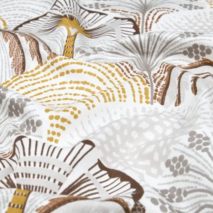 Tessuto twill cotone stampato palma geometrica gialla