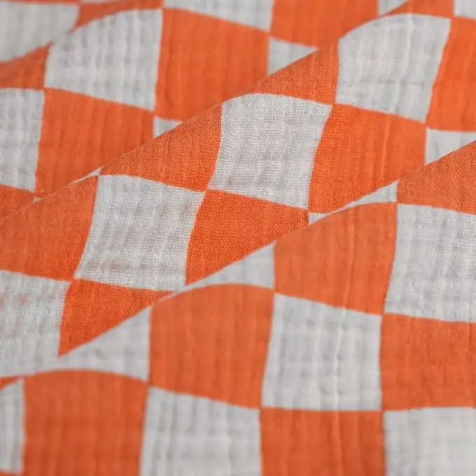 Tessuto doppio garza quadretti arancio
