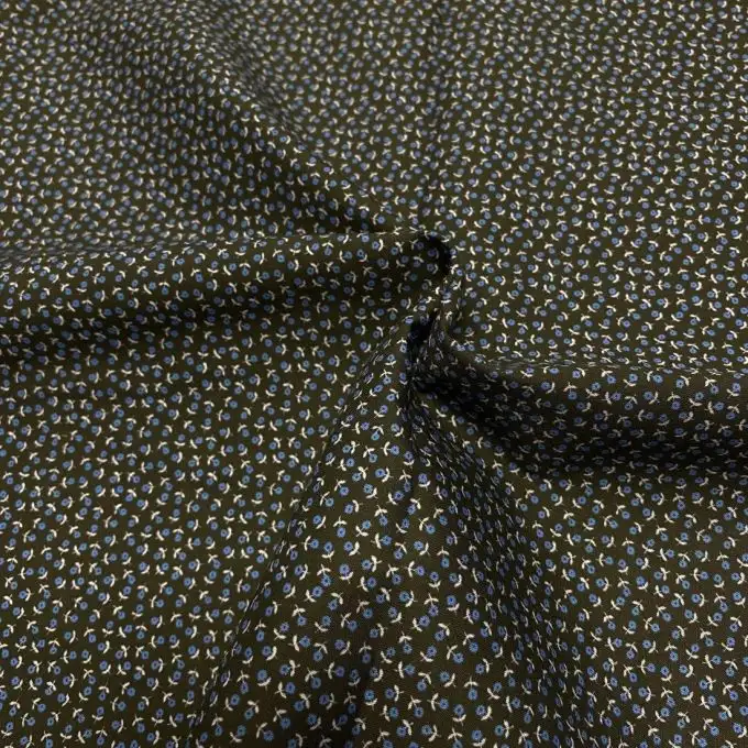 Tessuto voile di cotone morbido nero mini fiori blu