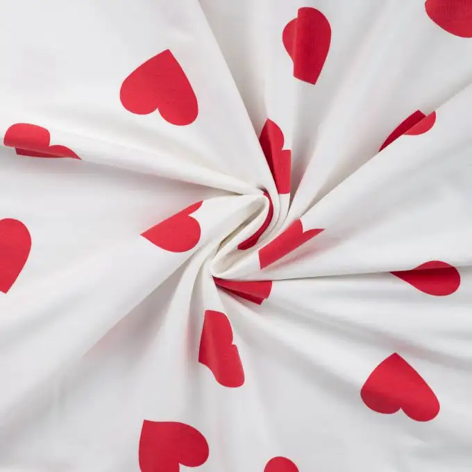 Tessuto french terry stampato cuore rosso ecru