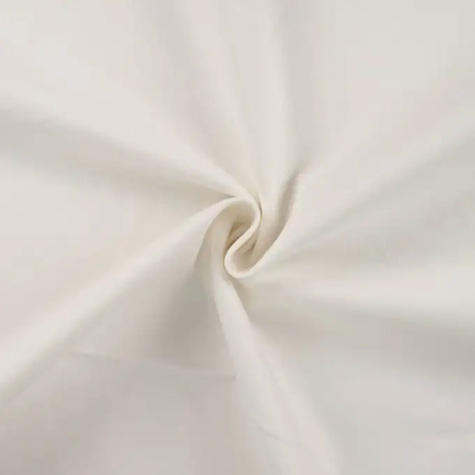 Tessuto denim cotone elasticizzato unito ecru