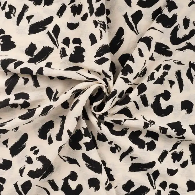 Tessuto viscosa stampato leopardo ecru