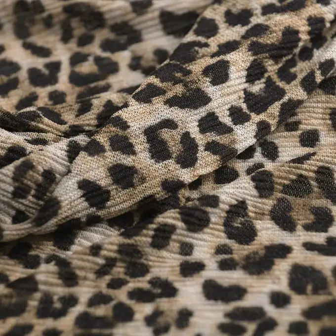 Tessuto rete leopardato beige