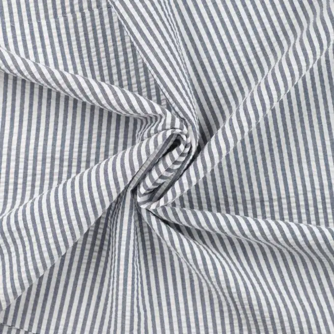Tessuto seersucker stampato righe blu navy