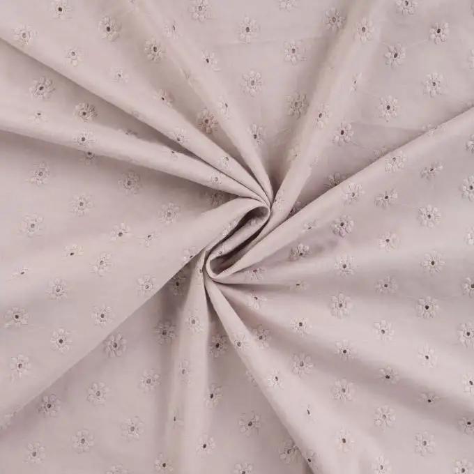 Tessuto cotone ricamato piccola margherita beige