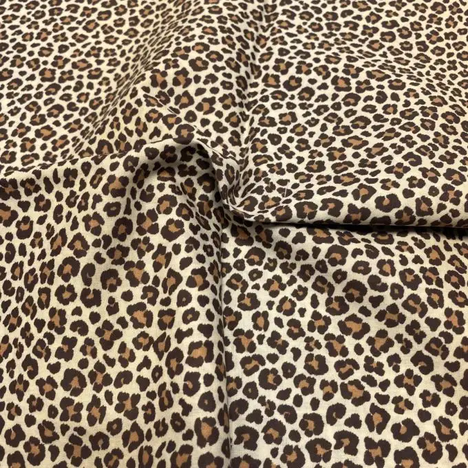 Tessuto voile di cotone morbido ecru piccolo leopardo marrone