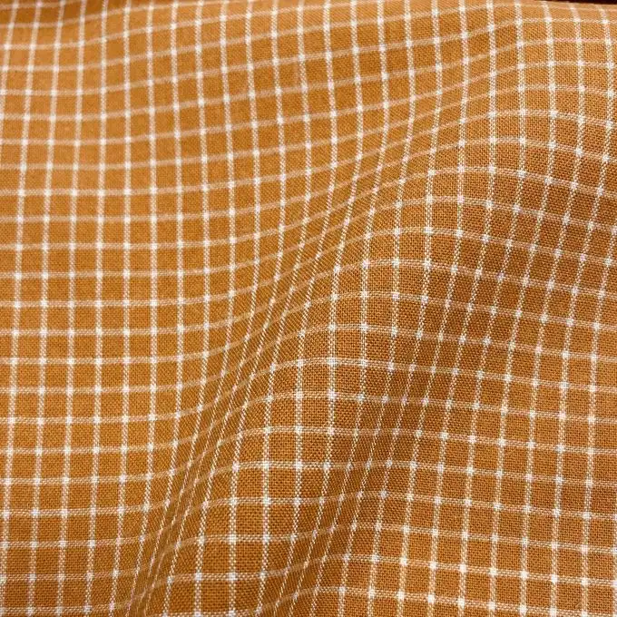 Tessuto cotone poliestere piccoli quadretti caramello