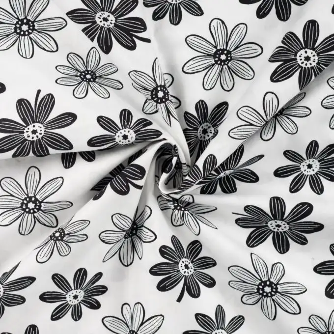 Tessuto popeline cotone stampato bella margherita nera bianca