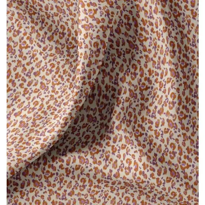 Tessuto cretonne cotone piccolo leone viola e ecru