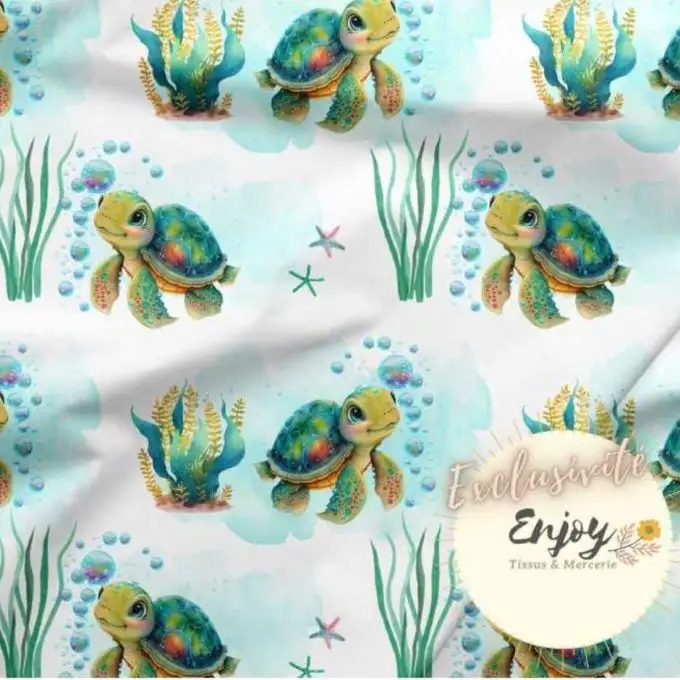 French Terry Tessuto Animali Mondo Marino Tartaruga Blu venduto al metro