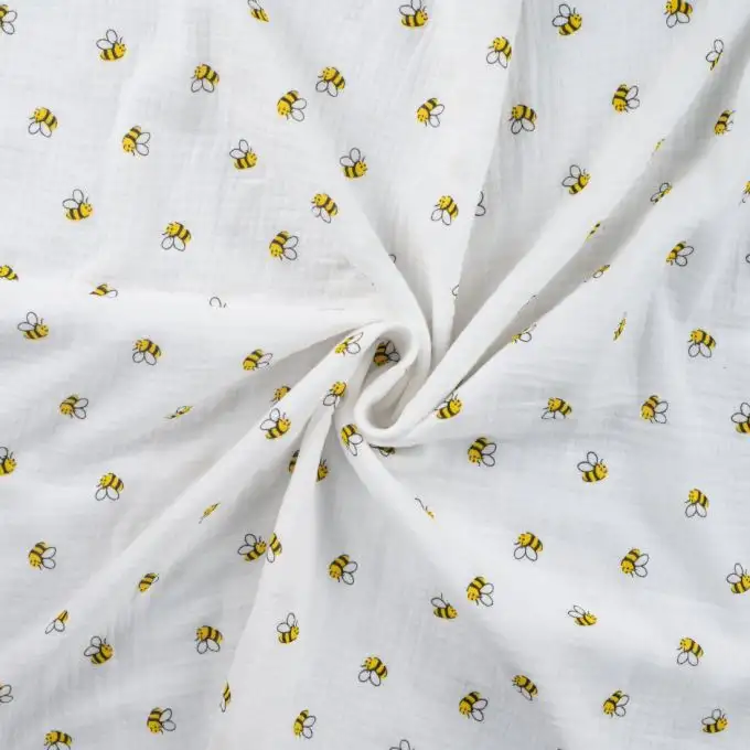 Tessuto doppio garza stampato api bianco