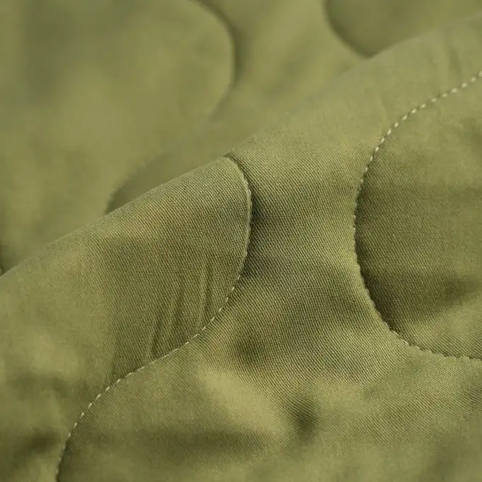 Tessuto trapuntato in viscosa tinta unita kaki