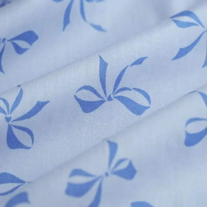 Tessuto popeline cotone nodi blu