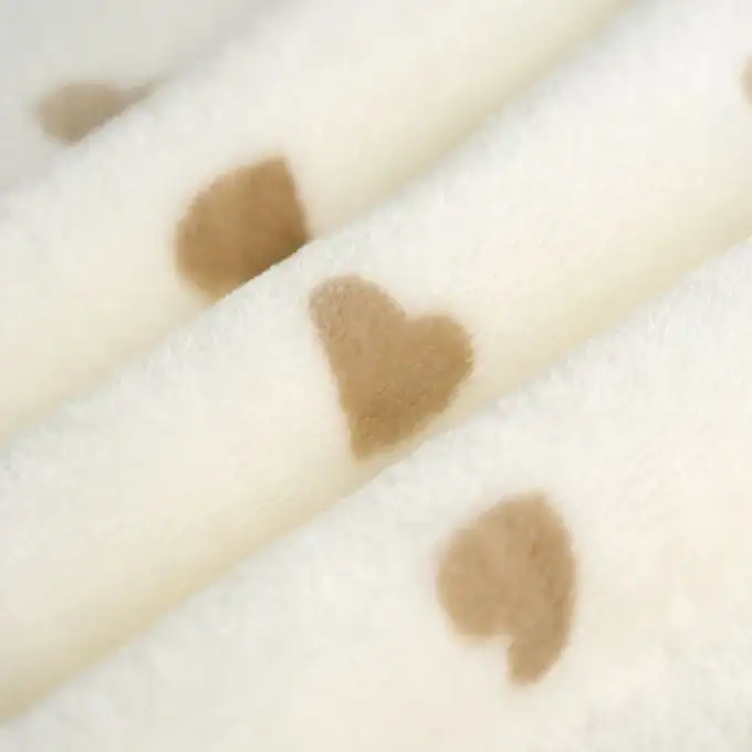 Tessuto coccoloso cuore talpa ecru