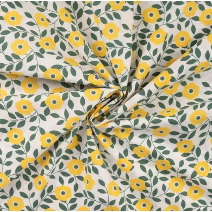 Tessuto popeline cotone stampato fiore naïf giallo