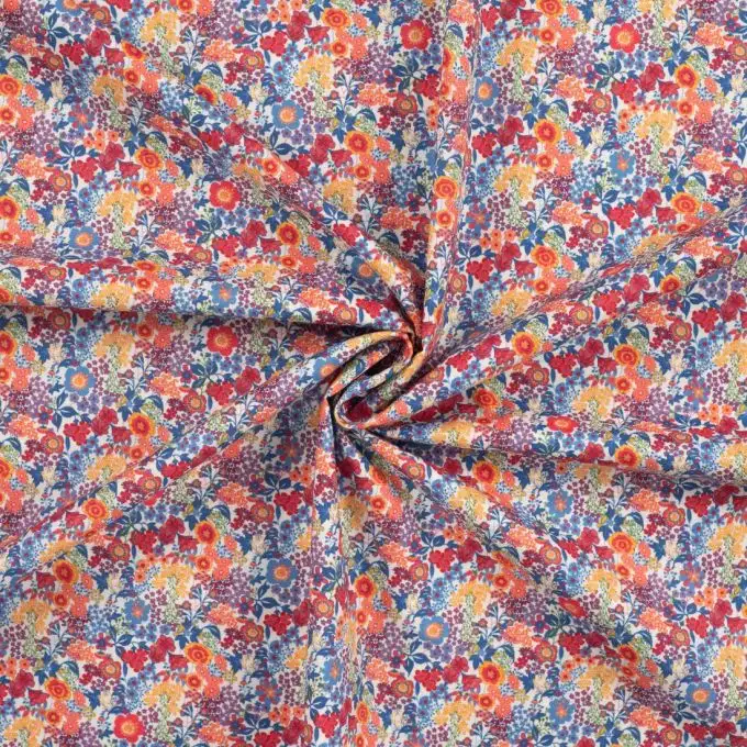 Tessuto voile cotone stampato fiori in festa multicolore