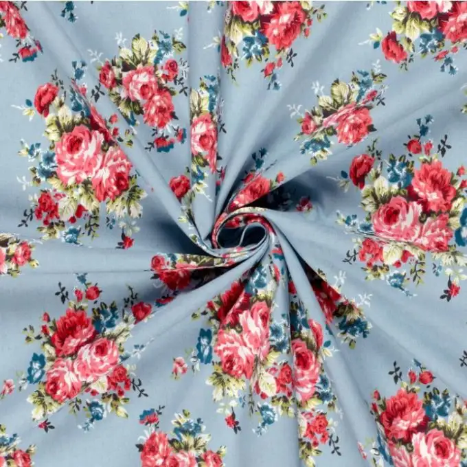 Tessuto chambray bouquet rose azzurro chiaro