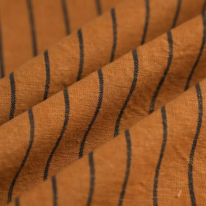 Tessuto misto lino cotone cammello fine righe nere