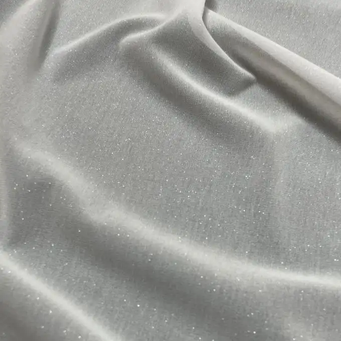 Tessuto voile georgette bianco glitterato argento origine Francia