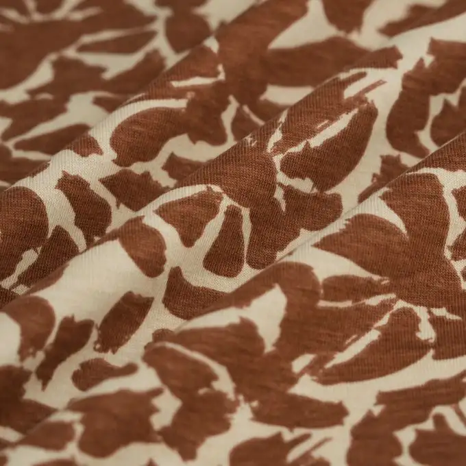 Tessuto jersey cotone floreale bicolore ocra ecru