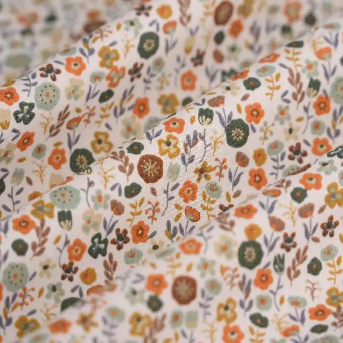 Tessuto popeline cotone fiorellino verde