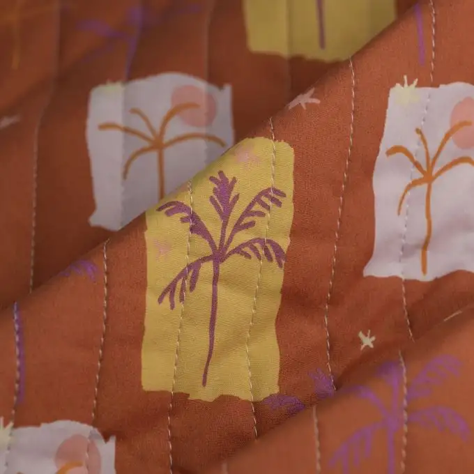 Tessuto trapuntato palma terracotta