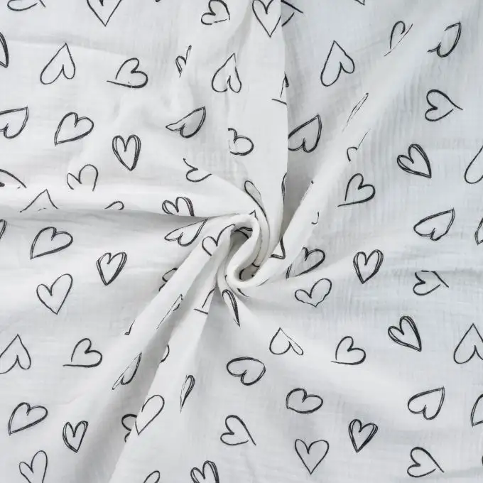 Tessuto doppio garza stampato cuore disegnato bianco