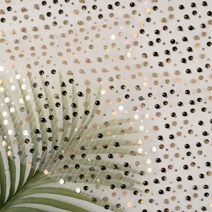 Tessuto tulle paillettes volant oro ecru
