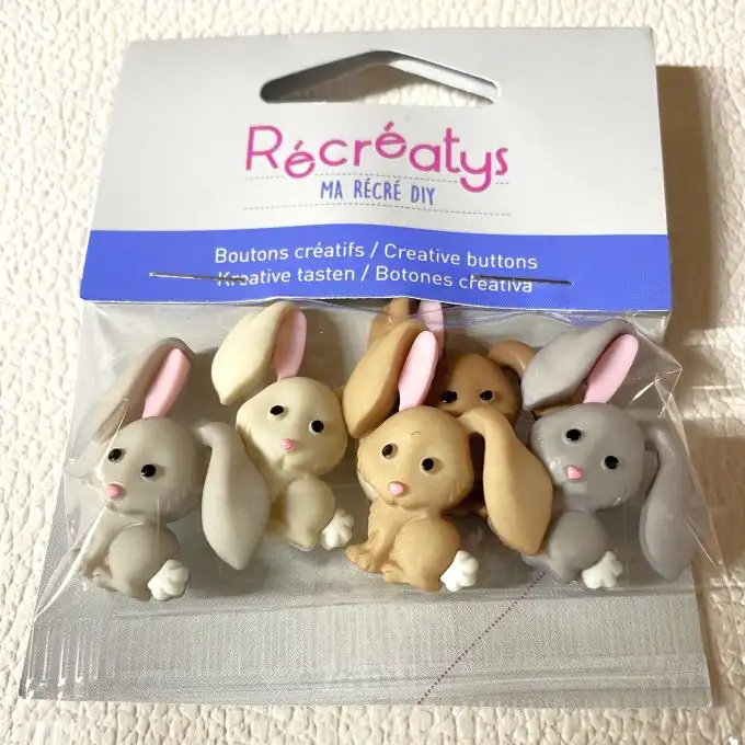 Set di 5 bottoni a forma di coniglio beige