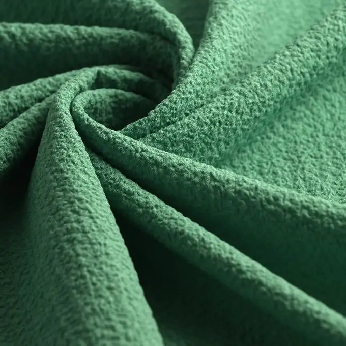 Tessuto crepe poliestere bubble unito verde