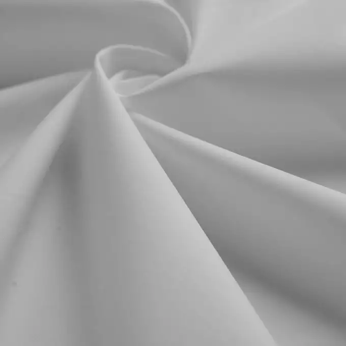 Tessuto popeline cotone cremoso unito ecru