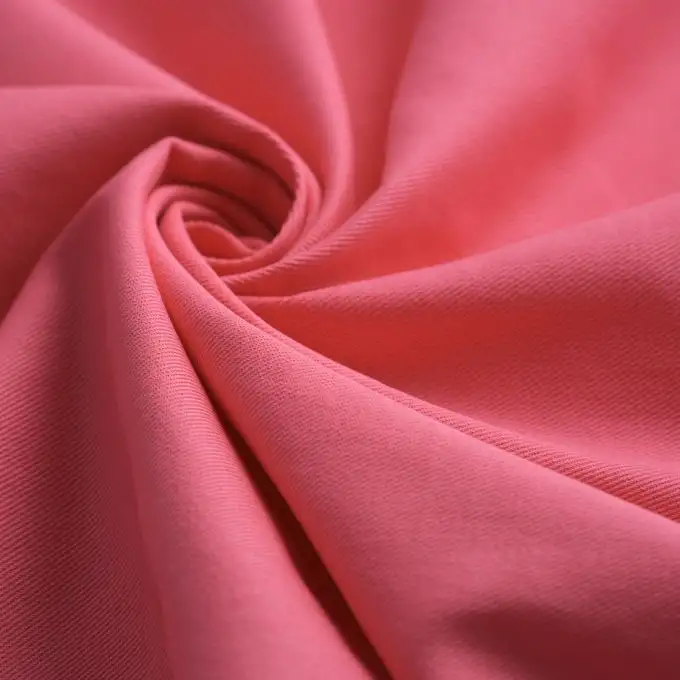 Tessuto twill cotone unito rosa acceso