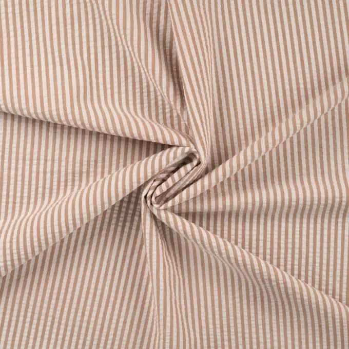 Tessuto seersucker stampato righe caramello