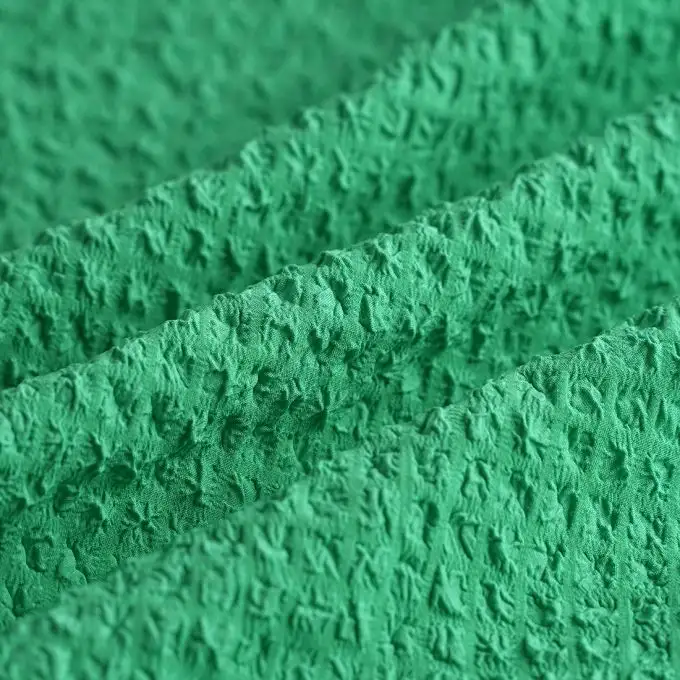 Tessuto voile poliestere elastan goffrato unito verde
