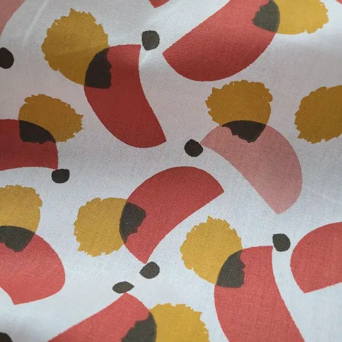 Tessuto cretonne macchiato organico rosso e ocra