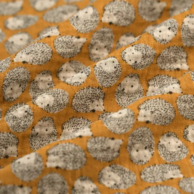 Tessuto doppia garza riccio miele