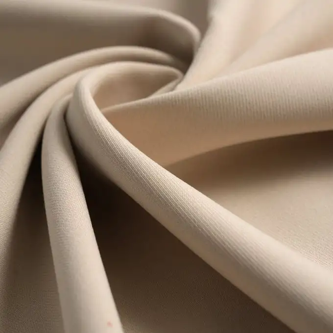 Tessuto gabardine poliestere viscosa elastan Zoé unito ecrù