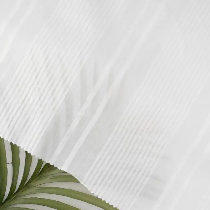 Tessuto seersucker cotone righe irregolari ecru