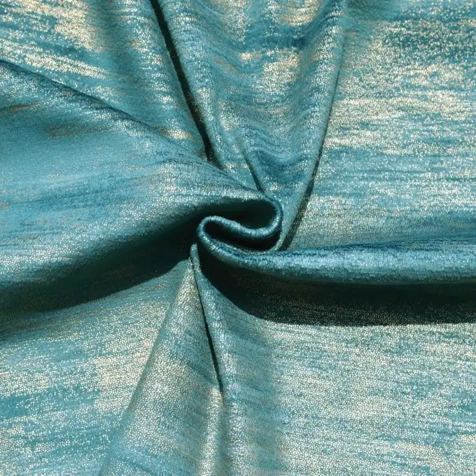 Tessuto velluto stampa oro blu pavone